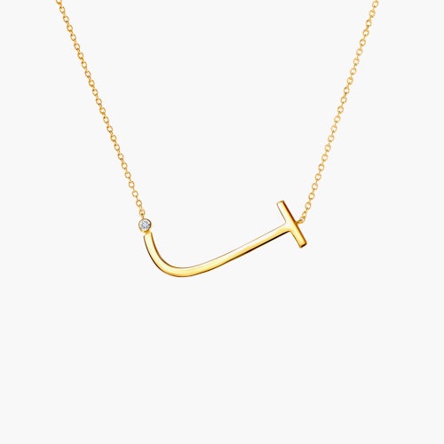 Naszyjnik celebrytka litera J Savicki: srebrny pozłacany, biały szafir